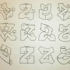 the letters and numbers are drawn on paper