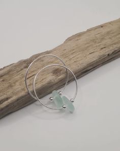 Large (40mm) statement sterling silver hoops, threaded with perfect light blue pieces of Welsh sea glass with added sterling silver beaded detailing. These are a perfect pair of hoops for that quirky, beachy, summer vibe and would make a beautiful addition to a holiday outfit. They come presented in a personalised gift box and wrapped in personalised wrapping paper, a perfect gift for someone special, or a lovely little treat for yourself! Beaded Sea Glass Jewelry For Beach, Beach Beaded Sea Glass Jewelry, Adjustable Small Hoop Jewelry For Beach, Handmade Turquoise Hoop Earrings For Beach, Round Sea Glass Jewelry For Beach, Round Sea Glass Beach Jewelry, Beach Hoop Earrings Wire Wrapped, Beach Hoop Earrings With Wire Wrapping, Blue Small Hoop Jewelry For The Beach