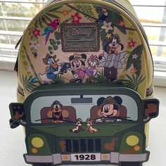 Brand New With Tags Loungefly Disney Mickey And Friends Jungle Safari Mini Backpack Glows In The Dark Green Disney Travel Bag, Disney Green Travel Bags, Disney Green Backpack, Green Disney Backpack, Green Disney Style Bags For Daily Use, Green Disney Bags For Everyday Use, Green Disney Backpack For Travel, Disney Green Travel Backpack, Green Disney Travel Backpack