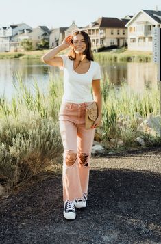 THIS SALE ITEM IS FINAL SALE! This is not a drill; The Siggy Denim are here and they won't last long. These pants come in a melon color, have a flare-style leg with a cropped length and distressed knees. When it comes to high-waisted pants, pockets are a necessity and lucky for us, these pants have four of them. They are comfortable and ready to rack in all of the compliments this summer. *True to size* Material Content: 100% Cotton Material Pattern: Distressed London is 5'4" and wearing a small Caribbean Dress, Color Melon, Perfect White Tee, Perfect Denim, Ivory Tops, Simple Trendy Outfits, Brown Sweater, Cream Dress, High Waisted Pants