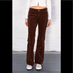 Low Rise Flare Leg Tight Fit Pants With 5 Pockets, Belt Loops, And A Button And Zipper Closure. Fabrics: 98% Cotton, 2% Elastane Measurement: 9.5" (24 Cm) Rise, 33" (84 Cm) Inseam, 30" (76 Cm) Waist Made In: China Low Rise Brown Corduroy Pants Outfit, Corduroy Pants Outfit, Brandy Melville Pants, Brown Trousers, Brown Pants, Corduroy Pants, Pants Outfit, Brandy Melville, Workout Pants