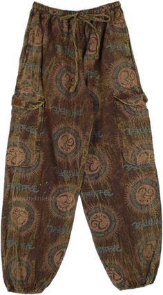 A pair of tropical bohemian handmade hippie print balloon style harem pants in one color.  These pants feature a mesmerizing hippie-inspired print and style that channels the free-spirited vibes of the 60s and 70s. #tlb #SplitSkirtsPants #bohemianfashion #Handmade #hippieharempants Casual Brown Printed Bottoms, Cotton Hippie Pants With Boho Print, Hippie Boho Print Cotton Pants, Hippie Style Cotton Pants With Boho Print, Hippie Cotton Pants With Boho Print, Hippie Style Beach Bottoms For Festivals, Hippie Style Brown Bottoms For Festival, Brown Hippie Bottoms For Festival, Hippie Style Brown Festival Bottoms