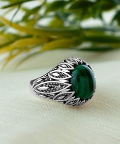 Indulge in luxury with this stunning 925 Sterling Silver Filigree Art Natural Malachite Gemstone Women Statement Ring. The intricate filigree designs are skillfully crafted to complement the natural beauty of the malachite gemstone, resulting in a timeless and elegant statement piece. Whether it's for a special occasion or an everyday accessory, this ring is a perfect addition to any jewelry collection. And it comes with a free luxurious gift box, making it an ideal present for your loved ones! Filigree Rings, The Ring Face, Mens Gemstone Rings, Casual Rings, Sterling Silver Mens Rings, Filigree Jewelry, Dome Ring, Detailed Ring, Statement Ring Silver