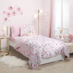 Create a cozy, inviting space for your child with this lovely watercolor floral twin size bed set. It includes one twin size quilt and one standard pillow sham. The watercolor floral print is in soft shades of pinks and grays and the quilt is 68” X 86”. The coordinating pillow sham is in a luxurious, soft pink minky fabric and is 23” X 29”. Mini Crib Bedding, Blossom Watercolor, Twin Size Quilt, Wall Decor Storage, Floral Wall Decals, Twin Quilt Size, Toddler Bed Set, Mini Crib Sheets, Sham Bedding