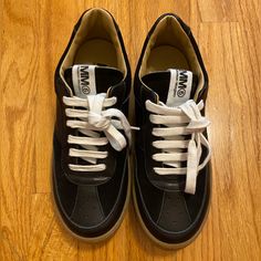 Description: Leather Lace-Up Sneakers From Mm6 Maison Margiela Kids Featuring Black, Calf Leather, Panelled Design, Perforated Toebox, Round Toe, Logo Patch At The Tongue And Flat Sole. Great Condition, Worn Once. There Are No Creases On The Front, Only Some Slight Marks Near The End Of The Shoe. I Still Have Crease Guards In These And Can Ship Them Alongside With The Shoe If Requested. I Am Selling Them Because I Realized They Don’t Fit As Well As I Desired Them To. I Wish I Can Keep Them, But They Need A Fitting Home! Includes Original Box, Which Is Good Condition. Authentic, I Bought These Off Farfetch A While Back, I Attached A Photo For Reference. Fast Shipping!! Crease Guards, Margiela Gats, Margiela Shoes, Martin Margiela, Mm6 Maison Margiela, Leather Lace, Panel Design, Mens Shoes Sneakers, Leather And Lace