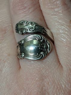 "This is a vintage sterling silver ring in the very popular Chantilly pattern. The Chantilly pattern was introduced by Gorham in 1895 and discontinued in 1950. It was designed by William Christmas Codman in 1895. This pattern has the Chantilly scroll design and fleur-de-lis accents which were inspired by the Rococo style of the early 18th-centiry France. The Inside of the ring is hallmarked \"Pat 1895 Sterling\" (hard to take picture of, but I did my best to capture this). It is a size 5.5, howe Antique Silver Adjustable Victorian Ring, Adjustable Antique Silver Victorian Ring, Antique Silver Engraved Ring, Antique Silver Engraved Open Ring, Victorian Silver Engraved Rings, Vintage Antique Silver Open Ring, Vintage Silver Engraved Ring, Antique Silver Open Ring Vintage Style, Vintage Open Ring In Antique Silver