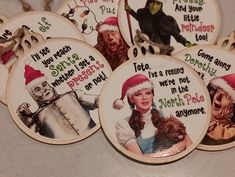 christmas ornaments with funny sayings and pictures on them, including an elf's hat