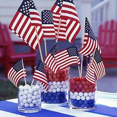 patriotic candy in glass vases with american flags