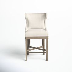 a white chair sitting on top of a white floor