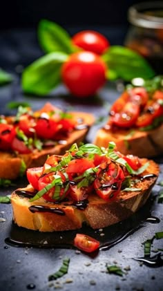 several pieces of bread with tomatoes on them