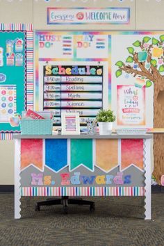 an office decorated with colorful papers and decorations