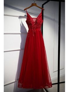 Tulle Evening Dress With Sheer Bodice And Spaghetti Straps, Red Spaghetti Strap Dress For Prom Season, Sheer Bodice Spaghetti Strap Tulle Evening Dress, Red Floor-length Dress For Prom Season, Red Formal Dress Long, Red V-neck Evening Dress For Prom Season, Red A-line Maxi Dress For Prom, V-neck Tulle Evening Dress With Sheer Bodice, Flowy Red Floor-length Dress