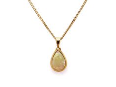 Jewelry Type: Pendant Metal: 18k Yellow Gold Measurements: 3/4 inch ( front face of charm) 16 inches (length of chain) Markings: 750 Weight: 3.3 grams Main Stone: Pear Shape Cabochon Cut Opal Color: Multi Color Measurements: 9mm x 6mm x 2mm Gem Weight: 0.60ct approx #11942 Formal Teardrop Cabochon Necklace, Yellow Gold Cabochon Teardrop Pendant Necklace, Teardrop Cabochon Necklace For Anniversary, Anniversary Teardrop Cabochon Necklace, Anniversary Cabochon Teardrop Necklace, Gold Pear-shaped Drop Necklace With Gemstone, Yellow Gold Pear-shaped Necklace, Gold Pear-shaped Necklace With Polished Finish, Gold Hallmarked Pear-shaped Necklace