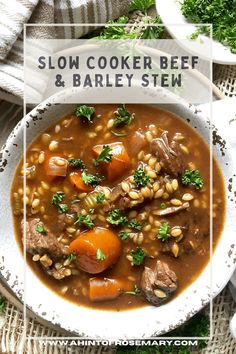 slow cooker beef and barley stew in a white bowl with parsley on the side