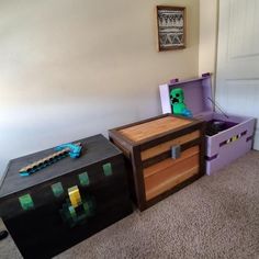 two toy chests sitting next to each other on the floor