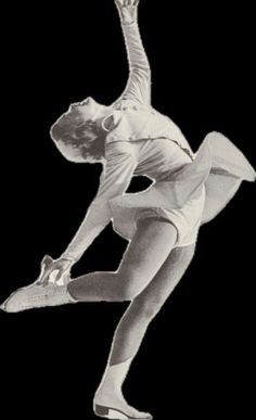 a black and white photo of a woman in the air