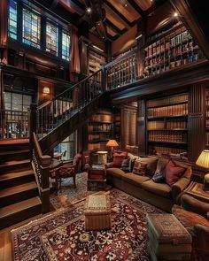 a living room filled with lots of furniture and bookshelves next to a stair case