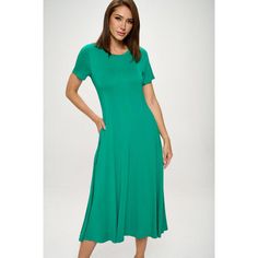 Our Jenesis T-Shirt Dress is perfect for both casual and dressier occasions with its relaxed yet flattering silhouette. Whether you're heading out for a casual brunch date or running errands, this short sleeve t-shirt midi dress with pockets is your go-to choice. Pair it with sneakers or sandals for a laid-back look or dress it up with heels and accessories for a more sophisticated ensemble. Made in USA. Material: 95% Rayon Modal 5% Spandex. Machine washable. Casual Stretch Midi Dress In Solid Color, Green Short Sleeve Midi Dress For Brunch, Spring Casual Midi Length T-shirt Dress, Casual Midi Length T-shirt Dress For Spring, Casual Stretch Midi Dress For Brunch, Casual Crew Neck Midi Dress, Casual Summer T-shirt Dress, Midi Length, Green Stretch Midi Dress Casual Style, Casual Midi-length T-shirt Dress For Summer