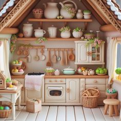 a doll house kitchen with pots and pans