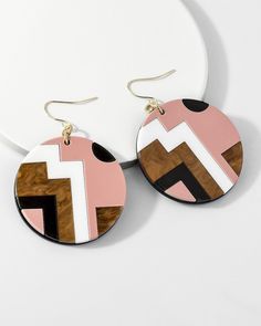 These earrings feature captivating geometric patterns inspired by Tangram style, creating a unique and eye-catching geometric ensemble. Elevate your style with the contemporary charm of these drop earrings, celebrating the fusion of fashion for a distinctive look. **Product name** Circular Pattern Tangram Style Geometric Drop Dangle Earrings **Size** Length: 6.2 cm; Width: 4.5 cm **Packaging** - Each order is thoughtfully packaged, arriving in a paper box accompanied by an exquisite silky jewellery bag. - For environmentally friendly, we have opted not to include the invoice and packing list by default. Should you require these documents, please do not hesitate to inform us. **Delivery** - Free UK Shipping using Royal Mail 2nd Class.  - All orders will be dispatched within 48 hours and are Modern Multicolor Geometric Jewelry, Pink Geometric Earrings, Trendy Geometric Earrings For Gifts, Modern Multicolor Earrings With Bold Design, Retro Geometric Jewelry Gift, Retro Geometric Jewelry For Gifts, Chic Geometric Earrings As Gift, Chic Geometric Earrings For Gift, Chic Geometric Earrings For Gifts