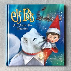 elf pets an arctic fox tradition