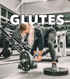 a woman squatting on a barbell with the words glutes in front of her