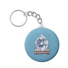 a blue round keychain with an image of the character gargoin on it