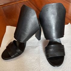 New Without Box, Beautiful Black Italian Leather Heeled Sandals From Couture Company Vic Matie! Size 36 Or 6 Us! 4” Heel With Open Toe! Unique And Beautiful Pair Of Sandals To Pair With Jeans Or A Dress! Never Used! No Box But Will Be Packed Very Well Prior To Shipping! Smoke And Pet Free Home!! Leather Mules With Deep Heel Cup For Night Out, Office Leather Sandals With Stacked Heel, Leather Sandals With Stacked Heel For Office, High Heel Leather Mules With Wrapped Heel, Leather High Heel Mules With Wrapped Heel, Leather Mules With Wrapped High Heel, Office Mules With Deep Heel Cup And Open Toe, Leather Sandals With Sculpted Heel For Night Out, Evening Leather Mules With Wrapped Heel