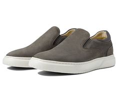 Florsheim Premier Plain Toe Slip-On Sneaker - Men's Shoes : Gray Nubuck : Ace the semi-formal look by wearing the Florsheim Premier Plain Toe Slip-On Sneakers. Leather upper. Man-made lining and removable insole. Fully cushioned Comfortech footbed with molded EVA for all-day comfort. Slide-in style. Elasticized gore for a snug fit. Round toe. Man-made outsole with high traction and durability. Imported. Measurements: Weight: 11 oz Product measurements were taken using size 9, width M (D). Please Slip-on Work Sneakers With Rubber Sole, Casual Slip-ons With Ortholite Insole For Work, Gray Cushioned Slip-ons, Gray Slip-ons With Cushioned Footbed, Comfortable Gray Slip-ons With Ortholite Insole, Casual Business Sneakers With Removable Insole, Gray Slip-ons With Textured Sole, Casual Slip-ons With Ortholite Insole For Fall, Casual Sneakers For Workwear In Fall