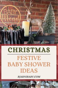 christmas festive baby shower ideas with deer, candles and presents on a table in front of a brick wall