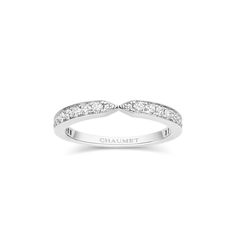 a white gold wedding band with diamonds