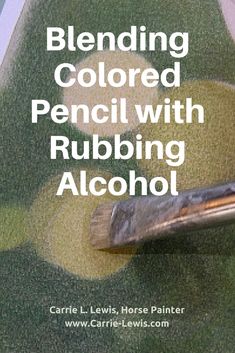 a close up of a paint brush on the cover of a book about blending colored pencils with rubbing alcohol