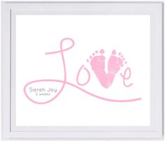 a card with a baby's foot and the word love written in pink ink