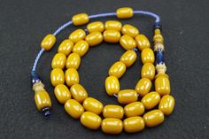 Tesbih Amber Rosary Original Prayerbead Handmade Rosary Kehribar Tesbih Beads Amber Tesbih Misbaha Islamic Prayer Beads Tasbih Tespih Prayer beads with 33 beads Bead size: 8 x 11 mm The rosary is completely handmade and a work of mastery. It has a perfectly processed and durable hand-knitted rope tassel. PRICE INCLUDES SHIPPING Please note: We offer the item in a variety. Variations in the size of the imams or beads are possible. Color deviations are also possible Note: Amber can change color over time due to abrasion and use. On warm days or due to prolonged use, the surface may feel more supple. Amber should be dry cleaned frequently to occasionally with cotton or similar cloths. We try to take photos that look as real as possible. However, it cannot be ruled out that color deviations ma Traditional Yellow Beads With 108 Count, Traditional Adjustable Amber Beads, Traditional Yellow Beads For Gift, Traditional Gold Beaded Rosary, Traditional Yellow Necklace With 8mm Beads, Rope Tassel, Handmade Rosary, Islamic Prayer, The Rosary