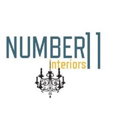 the number 1 interiors logo with chandelier hanging from it's center pole