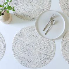 place setting with white plates and silverware