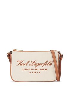 beige cotton canvas embroidered slogan adjustable shoulder strap top zip fastening main compartment internal slip pocket internal logo patch full lining Karl Lagerfeld Bag, Karl Lagerfeld Bags, Canvas Clutch, Strap Top, Strap Tops, Karl Lagerfeld, Patch Logo, Cotton Canvas, Clutch Bag