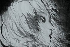 a black and white drawing of a woman's face with her hair blowing in the wind