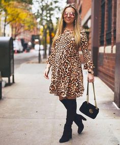 Trend alert: all things Leopard! Our fun-loving "Lennie" shift dress is flattering for stylish expecting mamas with super chic pockets and flare sleeves. Style with over-the-knee boots for fall. Only 2 left (XS, S)! Roomy shift style with loose fit, crisscross neckline Adorable pockets, 3/4 flared sleeves Above-the-knee length 96% Polyester and 4% Spandex Wear during and after pregnancy Click for Size Chart. Model wears size S. X-Small (0-2): Bust 28-33" Small (4-6): Bust 33-36" Medium (8-10): B Chic Maternity Dress For Fall, Fall Bell Sleeve Dresses For Workwear, Maternity Stores, Boots For Fall, Sleeves Style, Flare Sleeves, After Pregnancy, Fun Loving, Celebrity Look