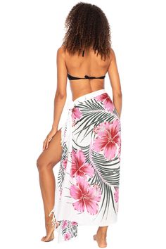 HAWAIIAN PARROT SARONG. Striking parrot sarong wrap with vibrant tropical colors gives you an exotic look and feel. Trimmed with boho fringed edges. Includes a coconut clip for easy tying GENEROUSLY SIZED at 67x 45, this swimsuit cover up fits most sizes. Wear it as a sarong skirt, wrap as a pareo dress, or wear as a shawl. Use for a beach blanket, tablecloth, even a colorful wall hanging 100% RAYON. With a soft, silky feel, rayon is a natural fiber that lets skin breathe. This bathing suit or b White Wrap Cover-up For Beach Party, White Floral Print Swimwear For Beach Cover-up, Tropical Tie-side Sarong For Vacation, Tropical Vacation Sarong With Tie-side, Tropical Tie-side Sarong For Pool, White Wrap Swimwear For Beach Season, Tropical Tie-side Sarong For Beach Cover-up, Bohemian Tropical Print Sarong For Pool, Bohemian Sarong With Tropical Print For Pool