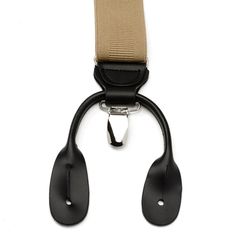 Look to tradition to create a modern, yet sophisticated style. Our Tan Clip/Button Suspenders are designed to provide support without sacrificing comfort. The expert craftsmanship of our leather crosspatch suspenders do not restrict movement and will remain in place without slipping or having to adjust. Suspenders add a unique and versatile look that can be dressed up with a suit, or dressed down with jeans and a blazer. Classic Brown Belts And Suspenders With Antique Buckle, Adjustable Black Leather Belts And Suspenders, Black Leather Belts And Suspenders With Adjustable Strap, Rustic Brown Adjustable Belts And Suspenders, Brown Adjustable Belts And Suspenders With Antique Buckle, Button Suspenders, Bar Studs, Tie Bar, Brand Collection