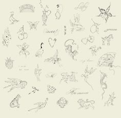 an image of various tattoos drawn on paper