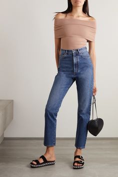 Alaïa's jeans are made with the same careful precision as the label's leather goods - the seaming on the back yoke is purposely placed to flatter your frame. Cut from structured denim, they're designed to sit high on the waist and have straight legs that hit just above the ankles. The classic blue wash will go with anything in your closet.