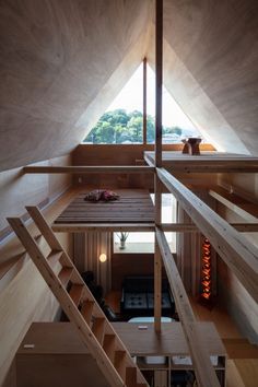 the inside of a house with stairs leading up to it