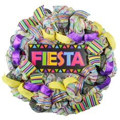 a colorful wreath with the word fiesta on it and ribbons around it in front of a white background