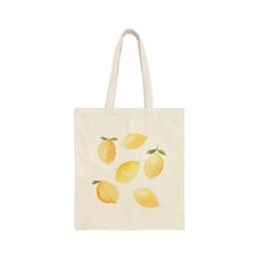 This 100% cotton bag is perfect for everyday wear! While the canvas material will show off your designs in great colors, it's durable and will last for years. The bag features 20" handles (made from the same canvas), making it easy to carry even with a week's worth of shopping. - 15" x 16" - 100% cotton canvas - Heavy fabric (12 oz/yd² (406.9 g/m - Sewn-in label Summer Canvas Bag With Large Capacity, Summer Large Capacity Cotton Canvas Bag, Trendy Yellow Cotton Shoulder Bag, Cotton Tote Canvas Bag For Everyday Use, Everyday Cotton Tote Canvas Bag, Casual Reusable Canvas Bag, Casual Cotton Beach Bag With Canvas Lining, Trendy Cotton Canvas Bag For Summer, Everyday Use Large Capacity Cotton Beach Bag