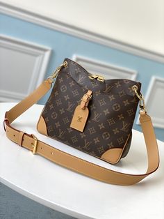 Description L.V Odéon PM Monogram Canvas Natural For Fall-Winter,  Shoulder And CrossBody Bags 11in/28cm LV M45354 Rep 1:1 For Fall-Winter 2020, L.V introduces the new Odéon PM, a stylish and functional shoulder bag. Made from Monogram canvas, this new zipped besace evokes the House’s heritage with its natural name tag and reinforced corners. A surprisingly roomy interior make it practical while an adjustable leather strap allows comfortable shoulder or crossbody wear. 28 x 25 x 9 cm / 11 x 9.8 x 3.5 inches (Length x height x width) Natural Monogram coated canvas Textile lining Gold-color hardware Double zip closure Outside flat pocket with magnetic closure Inside flat pocket Strap:Removable, adjustable –  Includes dust bag. –  This product is of the best quality. Crossbody Louis Vuitton, Louis Vuitton Odeon, Pm Monogram, Louis Vuitton Crossbody, Practical Bag, Big Bag, Vuitton Bag, Sierra Leone, Monogram Canvas