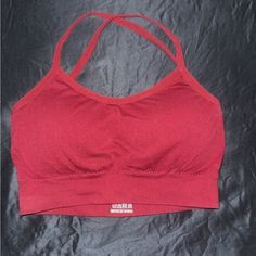 Xs Maroon Sports Bra Never Worn Red Sports Bra With Seamless Stretch Construction, Red Seamless Stretch Sports Bra, Casual Red Seamless Sports Bra, Red Sports Bra With Seamless Construction For Workout, Red Seamless Sports Bra With Medium Support, Red Seamless Sports Bra Athleisure Style, Red Seamless Sports Bra For Workout, Red Seamless Sports Bra For Athleisure, Red Seamless Sports Bra