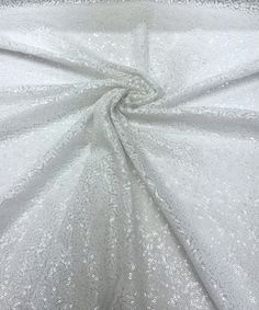 White Sequin Fabric, Glitz Stretch White Sequin Mesh Fabric by the yard. White Sequin Fabric for Wedding Decoration, Sequin Dress, Bridal Dress, Fancy Table Runners, Sequin Tablecloth, Party Dress, Sequin Backdrop and more. Beautiful shiny iridescent sequins are sewn all over the mesh. Iridescent effect offers a different color from various positions, while the construction provides a flexible drape, perfect for overlaying darling skirts and dresses. Sheer and stretchy, this unique textile can b Metallic Sequin Fabric With Shimmer For Wedding, Metallic Shimmer Sequin Fabric For Wedding, Fitted Shimmer Sequin Fabric For Wedding, White Shimmer Sequin Fabric For Wedding, Elegant White Sequin Fabric, White Glitter Sequin Fabric For Wedding, White Glitter Tulle Fabric For Wedding, Party Dress Sequin, Fancy Table