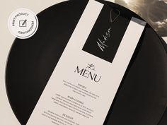 a black plate with a menu on it